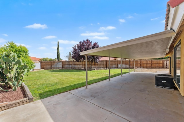 view of patio with a fenced backyard and central AC