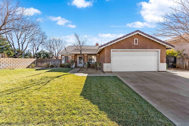 ranch-style home with a front yard and a garage