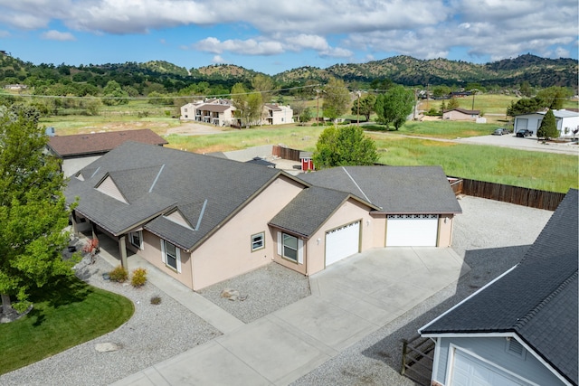 view from above of property with a mountainous background