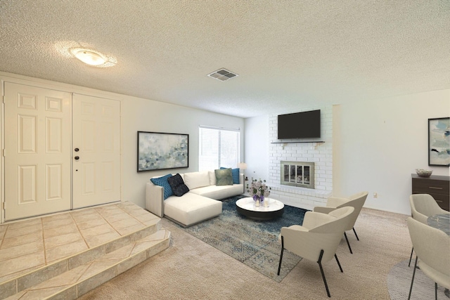 carpeted living room featuring a brick fireplace, tile patterned flooring, visible vents, and a textured ceiling