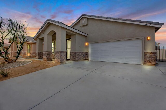 view of front of property featuring a garage