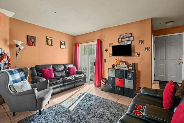 living room featuring light tile patterned floors