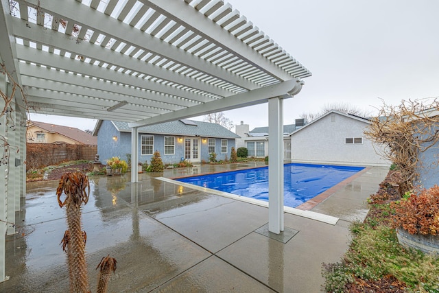 view of pool featuring a pergola and a patio area