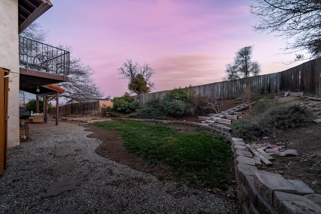 view of yard with a fenced backyard