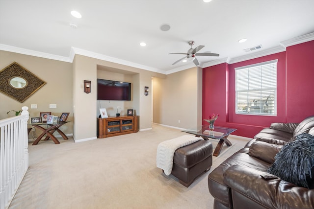 living room with light carpet, ornamental molding, and ceiling fan