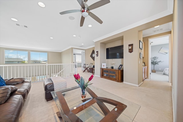 carpeted living room with ornamental molding