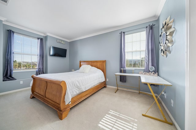 carpeted bedroom featuring multiple windows and crown molding