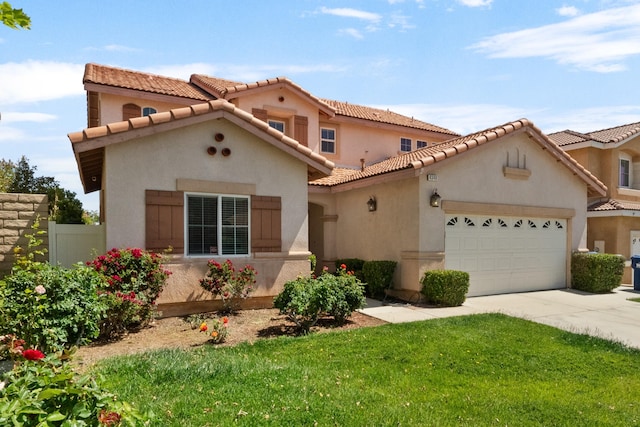 4349 Bethpage Dr, Palmdale, CA 93551 - mediterranean / spanish home with a garage, stucco siding, a tile roof, and driveway