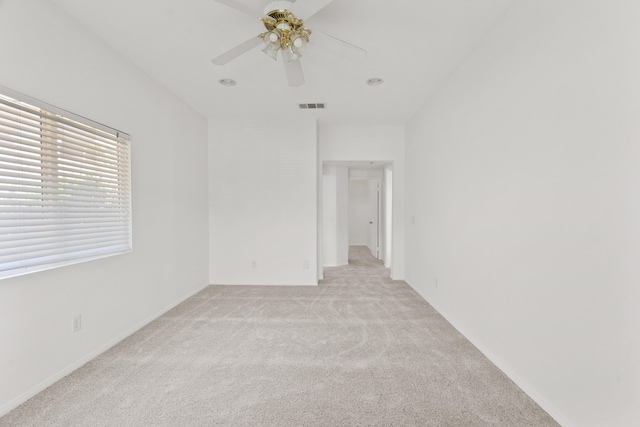 4349 Bethpage Dr, Palmdale, CA 93551 - empty room featuring light carpet, ceiling fan, and baseboards