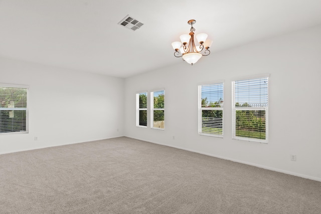 4349 Bethpage Dr, Palmdale, CA 93551 - spare room with a chandelier, carpet floors, and baseboards