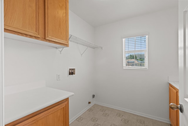 4349 Bethpage Dr, Palmdale, CA 93551 - laundry area featuring cabinet space, baseboards, washer hookup, and light floors