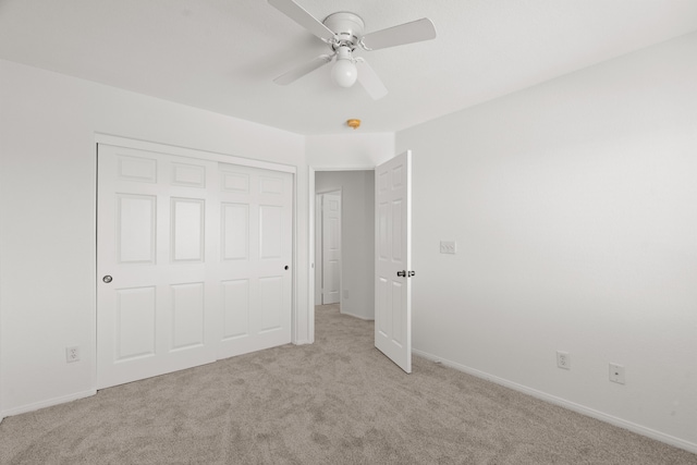 4349 Bethpage Dr, Palmdale, CA 93551 - unfurnished bedroom featuring light colored carpet, baseboards, a closet, and ceiling fan