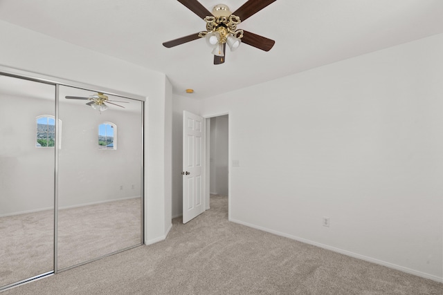 4349 Bethpage Dr, Palmdale, CA 93551 - unfurnished bedroom with light carpet, baseboards, a closet, and ceiling fan
