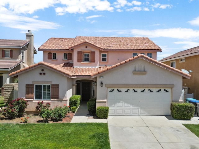 4349 Bethpage Dr, Palmdale, CA 93551 - mediterranean / spanish home with stucco siding, concrete driveway, a tile roof, an attached garage, and a front yard