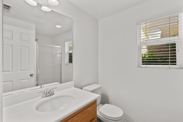 4349 Bethpage Dr, Palmdale, CA 93551 - full bathroom featuring a shower with shower door, vanity, and toilet