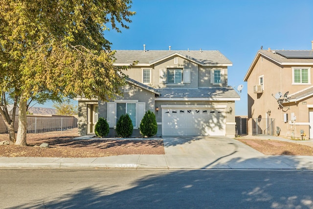 front of property with a garage