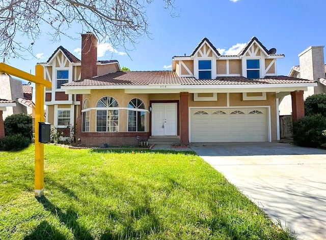 view of front facade with a front lawn, concrete driveway, an attached garage, brick siding, and a chimney