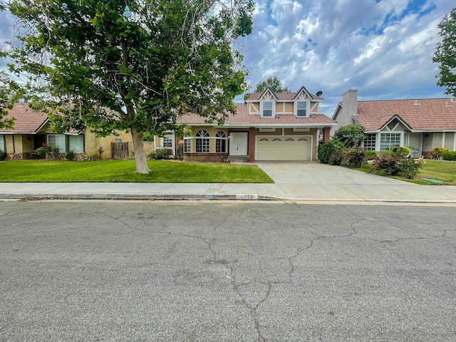 578 Conifer Dr, Palmdale, CA 93550 - traditional-style home with concrete driveway and a front lawn