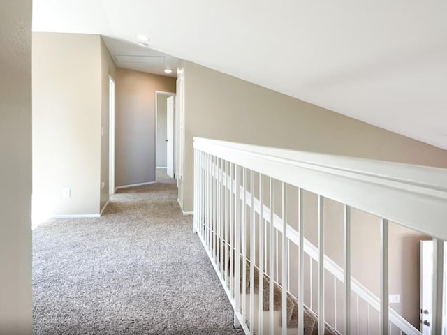 hall with recessed lighting, baseboards, and carpet floors