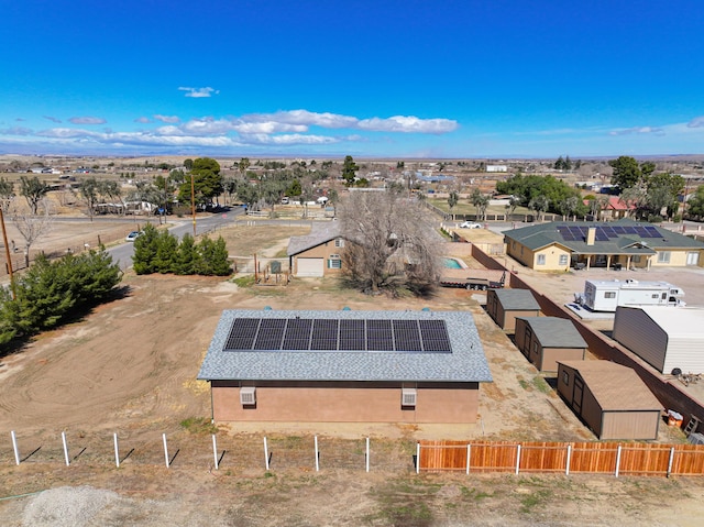 birds eye view of property with a residential view