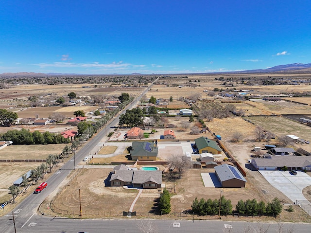 aerial view featuring view of desert and a mountain view