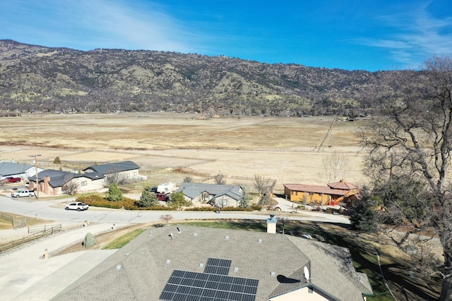 drone / aerial view featuring a mountain view