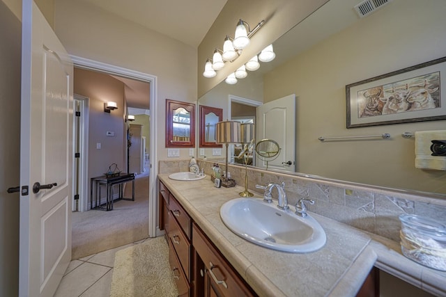 bathroom with vanity and tile patterned floors