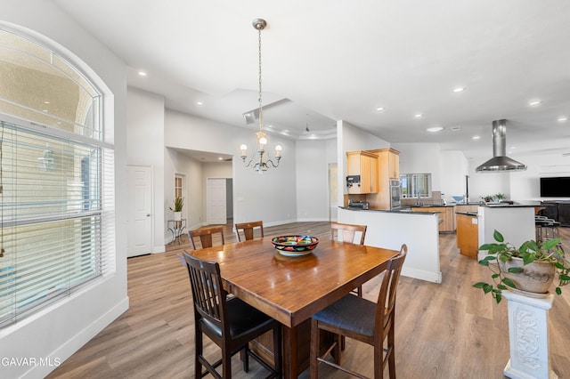42094 W 21st St, Lancaster, CA 93536 - dining space with recessed lighting, light wood finished floors, and a chandelier
