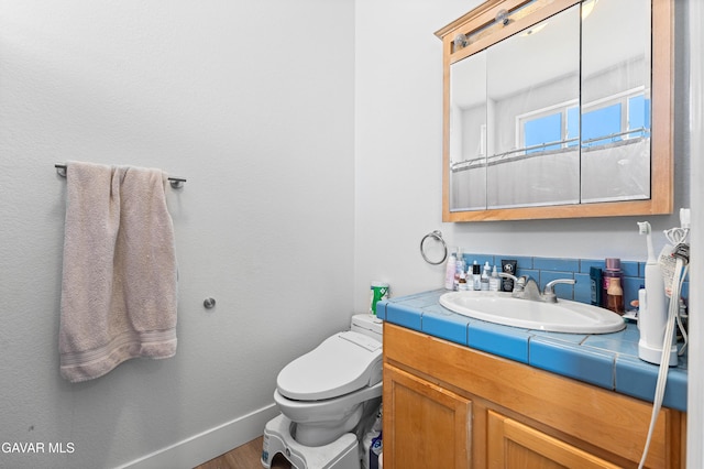 42094 W 21st St, Lancaster, CA 93536 - half bathroom featuring vanity and wood finished floors