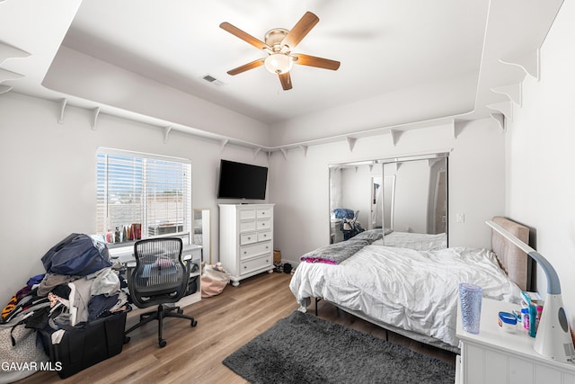 42094 W 21st St, Lancaster, CA 93536 - bedroom featuring light wood-style floors, a ceiling fan, a closet, and an office area