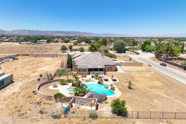 42094 W 21st St, Lancaster, CA 93536 - aerial view of property and surrounding area featuring a pool and a mountain backdrop