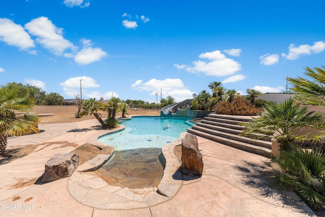 42094 W 21st St, Lancaster, CA 93536 - outdoor pool with a water slide and a patio area
