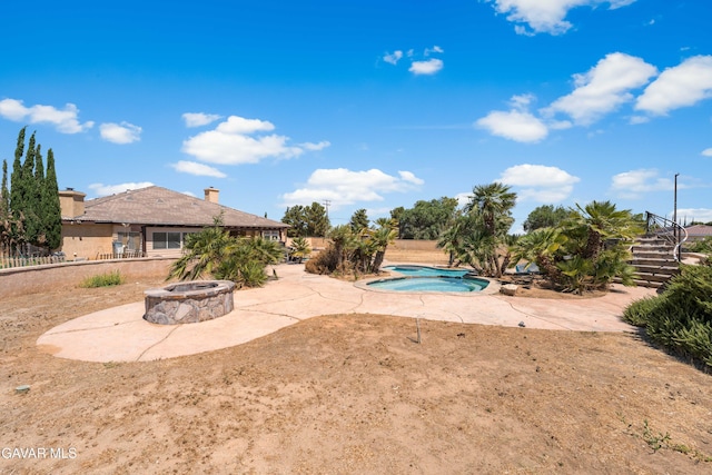 42094 W 21st St, Lancaster, CA 93536 - view of swimming pool featuring an in-ground hot tub, a fire pit, a patio area, and stairway