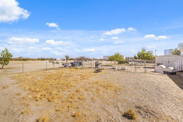 view of yard featuring a rural view