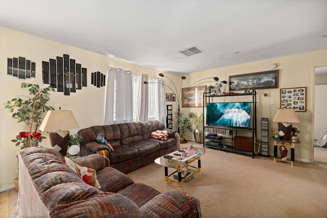 living room featuring light carpet