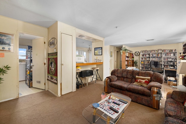 living room featuring light colored carpet