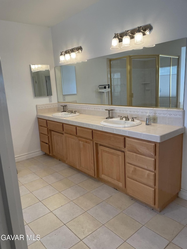 32941 Agua Dulce Canyon Rd, Agua Dulce, CA 91390 - bathroom featuring double vanity, tile patterned floors, and an enclosed shower