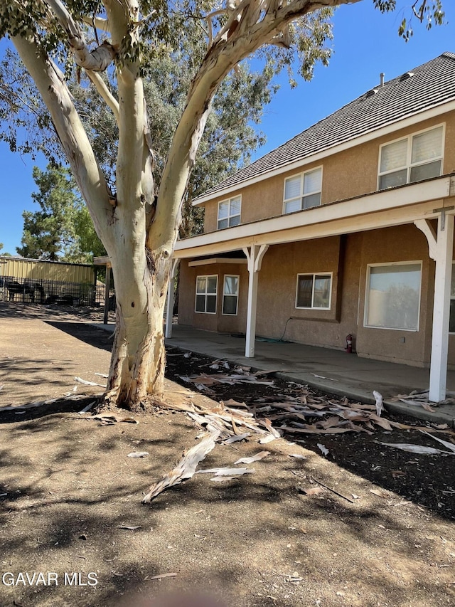 32941 Agua Dulce Canyon Rd, Agua Dulce, CA 91390 - view of front of property featuring stucco siding and a patio area