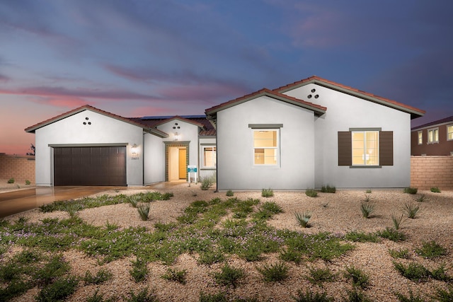 view of front of property featuring a garage