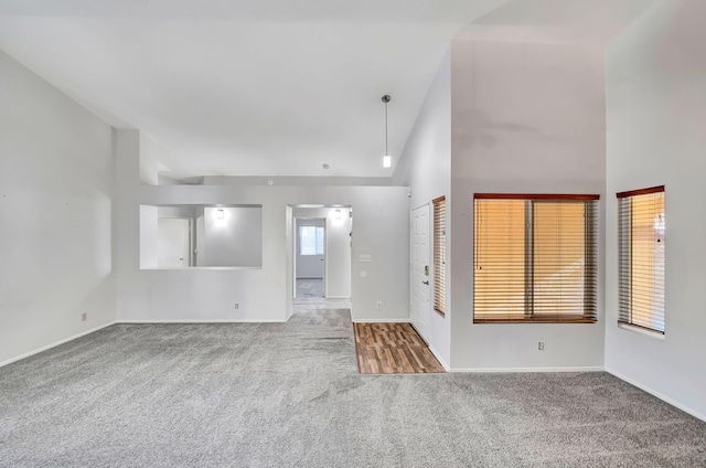 interior space with high vaulted ceiling