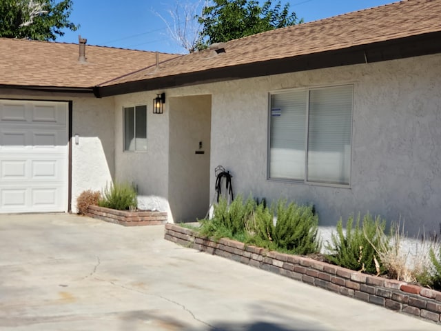 entrance to property featuring a garage