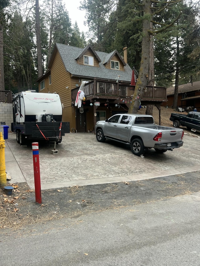 view of front of property featuring a deck