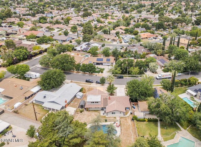 43818 Halcom Ave, Lancaster, CA 93536 - aerial perspective of suburban area with a pool