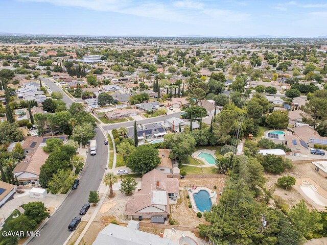 43818 Halcom Ave, Lancaster, CA 93536 - aerial perspective of suburban area with a pool
