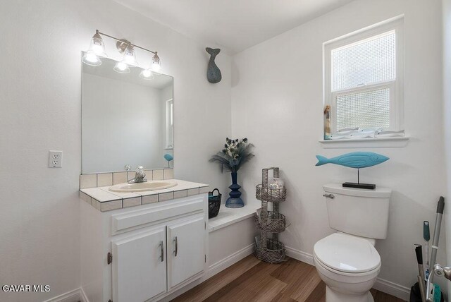 43818 Halcom Ave, Lancaster, CA 93536 - bathroom with vanity and wood finished floors