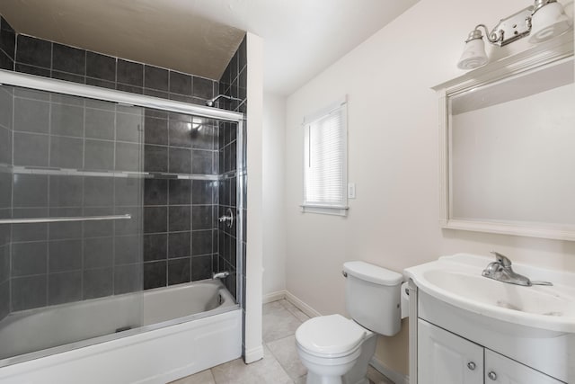 full bathroom with tile patterned floors, vanity, toilet, and enclosed tub / shower combo