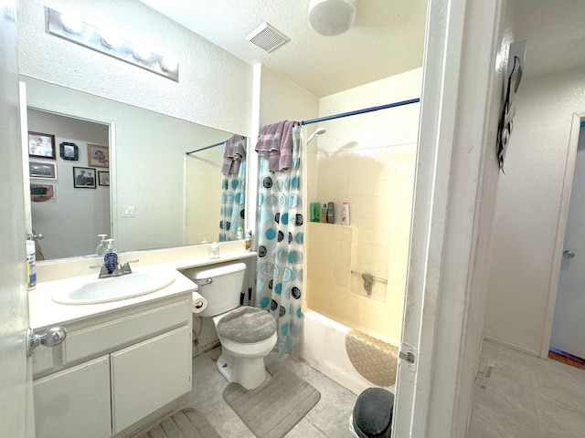 full bathroom featuring vanity, tile patterned flooring, toilet, a textured ceiling, and shower / tub combo with curtain