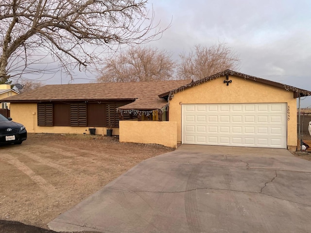 view of front of property featuring a garage