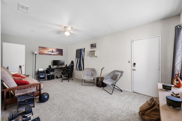 interior space with visible vents, baseboards, a wall mounted AC, and a ceiling fan