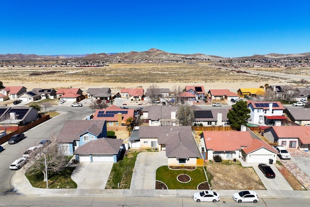 bird's eye view featuring a mountain view and a residential view